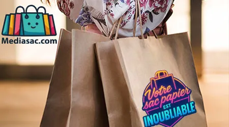 Sacs en papier kraft personnalisés Mediasac.com portés à la main, avec message marketing coloré pour commerce de proximité.